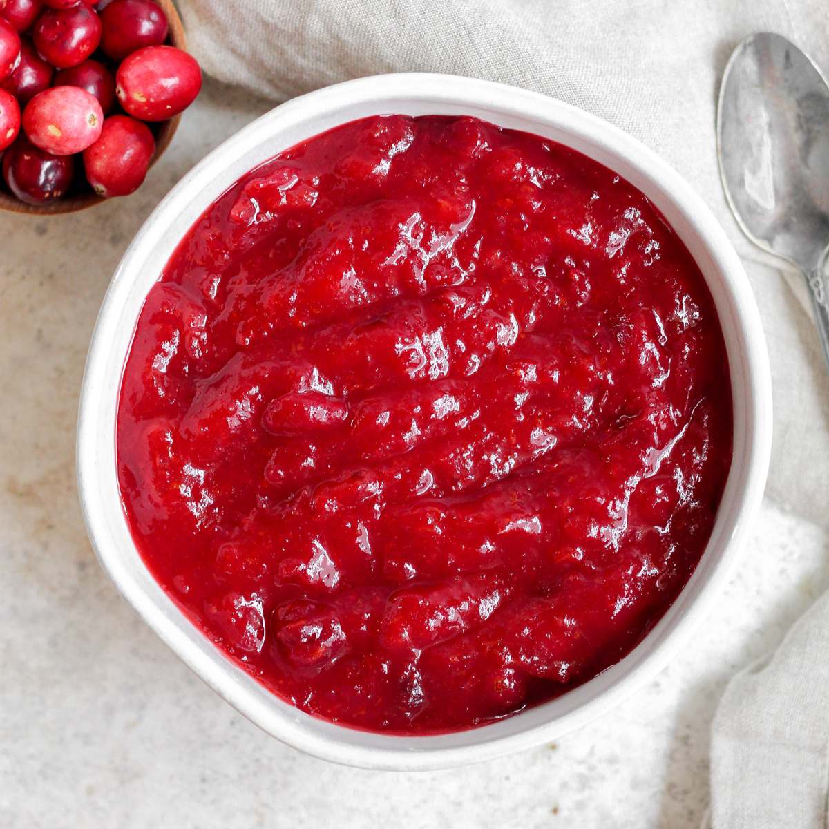 Gluten free cranberry sauce in a white bowl.