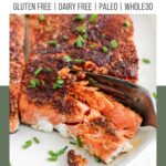 A Pinterest poster of a filet of baked blackened salmon on a plate with chives sprinkled around.