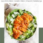 A Pinterest pin poster of buffalo chicken laying on top of caesar salad.