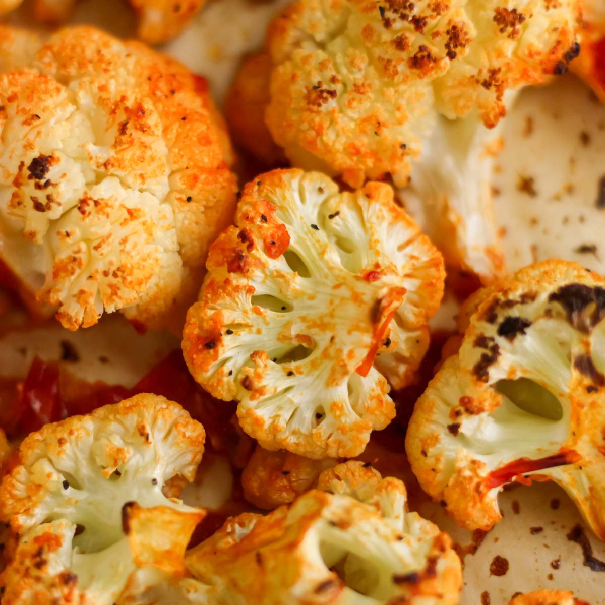 Harissa roasted cauliflower on a sheet pan.