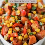 A Pinterest pin poster with a bowl of sweet potato succotash sitting on a tea towel.