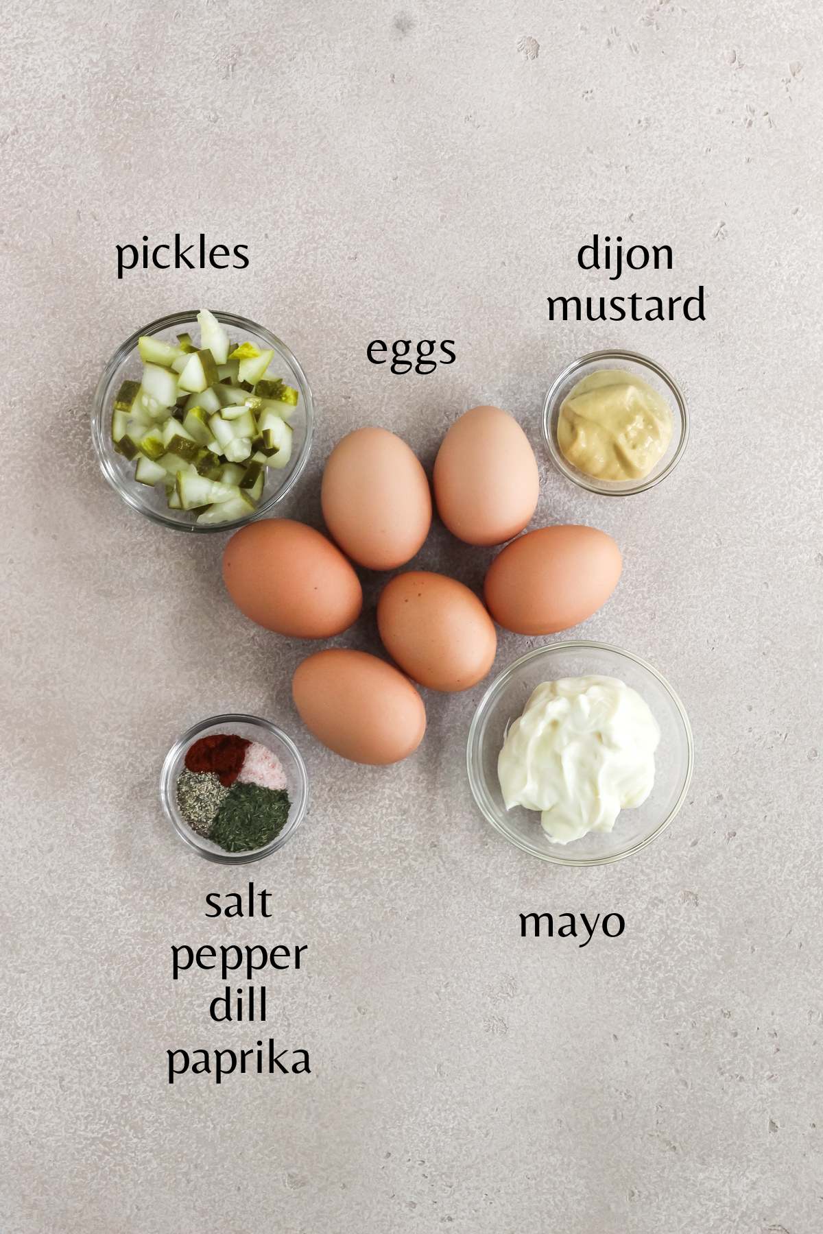 Ingredients needed to make dill pickle egg salad.