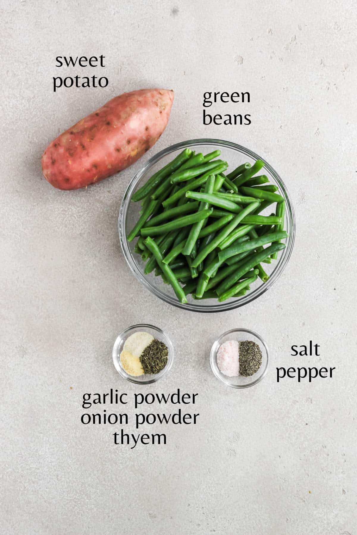 Ingredients needed to make roasted sweet potatoes and green beans.