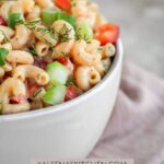 A Pinterest pin with a bowl filled with buffalo ranch protein pasta.