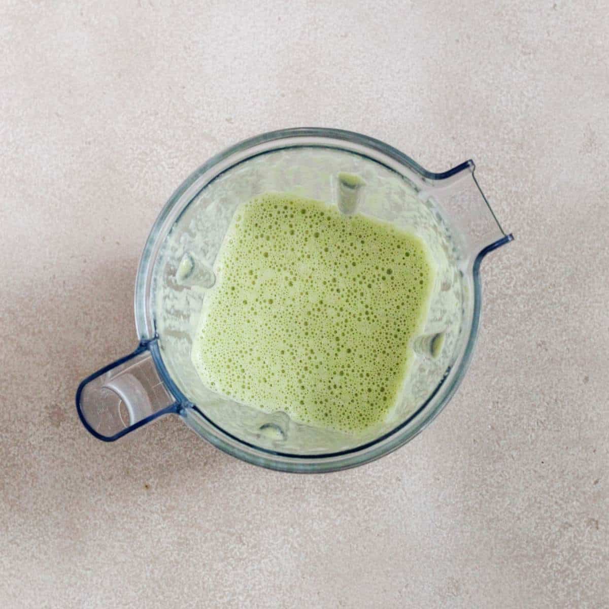 Creamy poblano sauce in a blender.