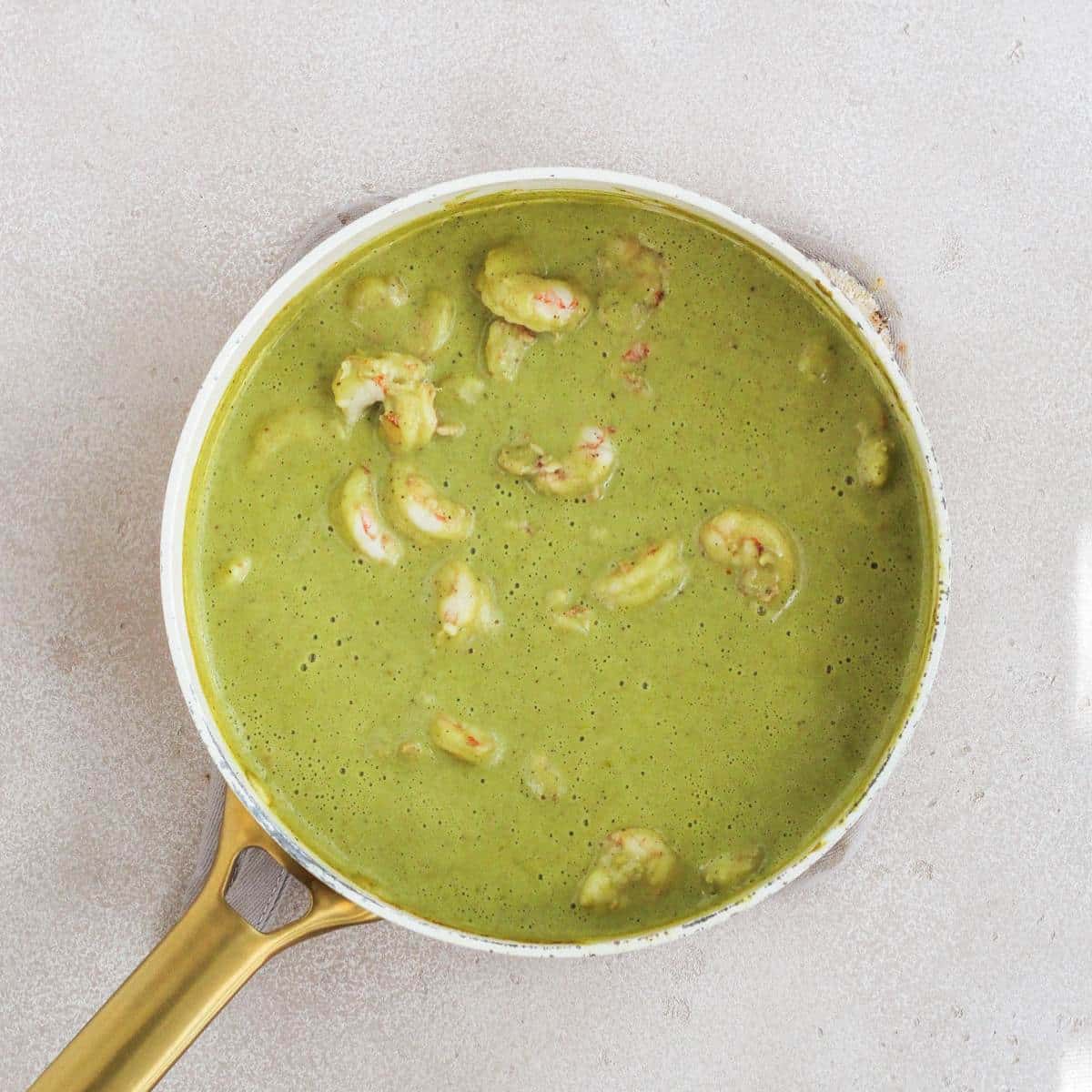 Creamy poblano shrimp in a pan.
