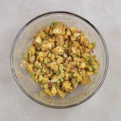 Buffalo ranch potato salad in a glass bowl.