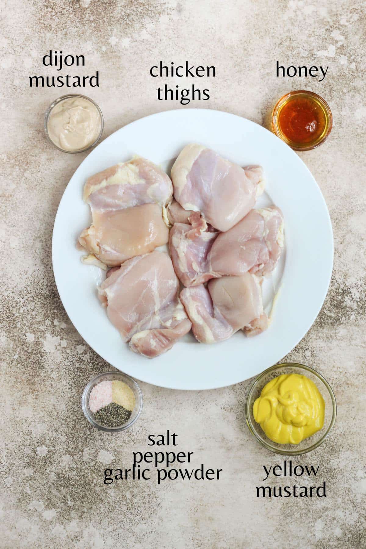 Ingredients needed to make honey mustard chicken thighs.